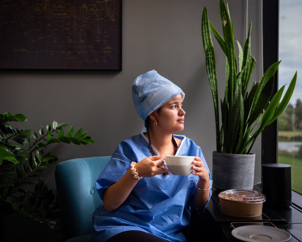 Aria enjoys the lake view during her lunch at The Maitland Clinic. 